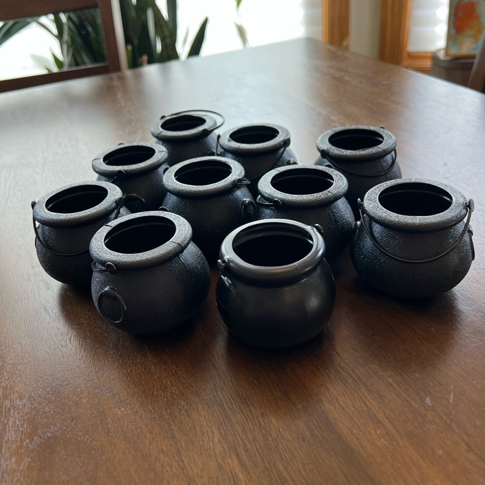 Ten Black Cauldrons